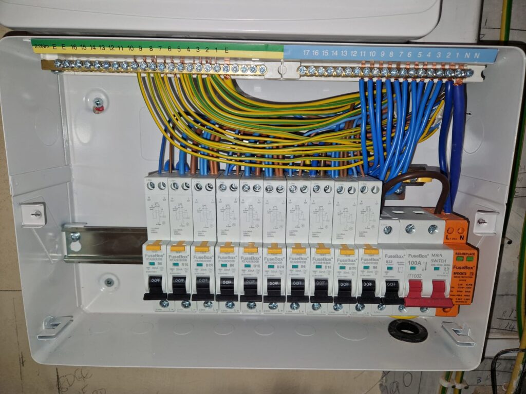 Consumer unit inspection during an EICR in Eastbourne